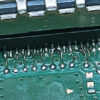 Close-up of PS5 HDMI port on motherboard after repair at Tech Lab